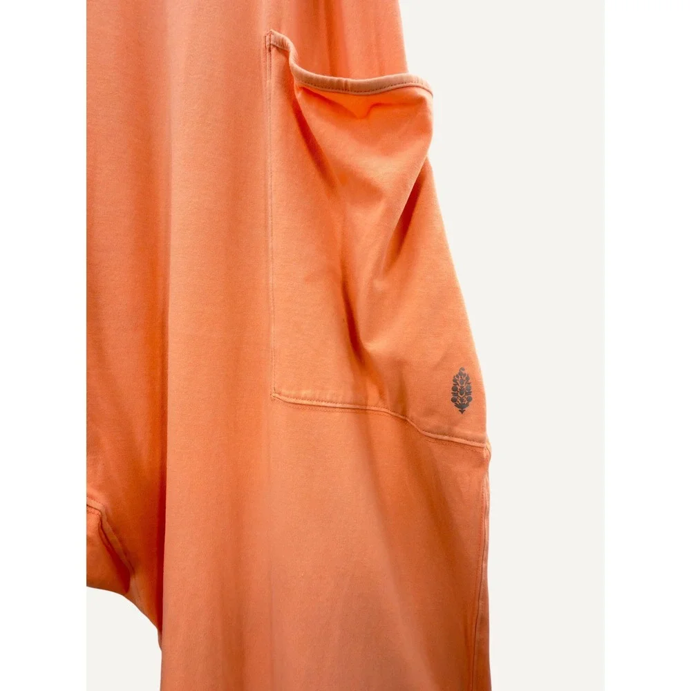 FP Movement Hot Shot Jumpsuit M Peach Boho Romper Pockets Racerback Yoga Comfy